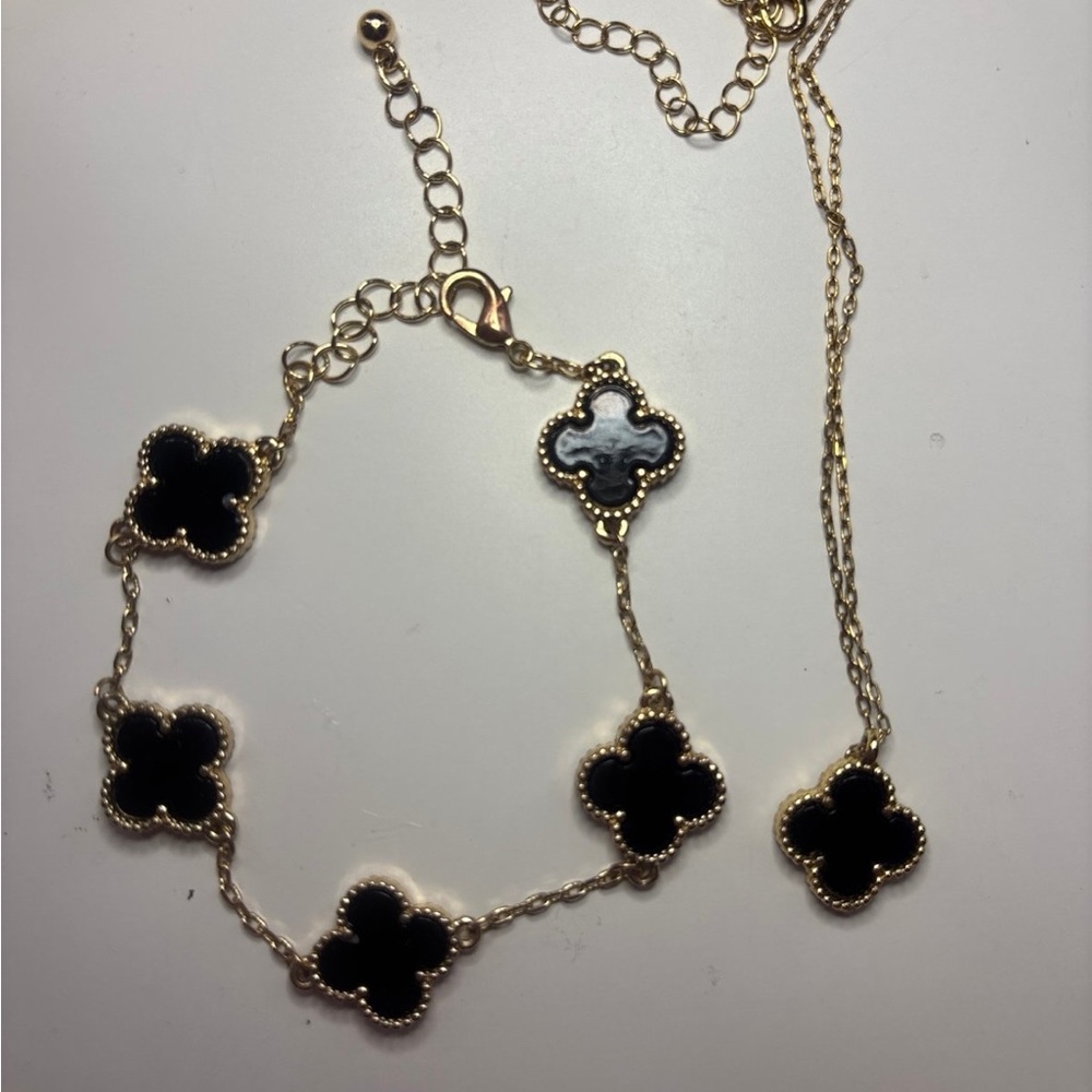 Elegant Gold and Black Clover Necklace and Bracelet Set